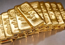 الذهب يتراجع لليوم العاشر متأثراً بارتفاع الدولار