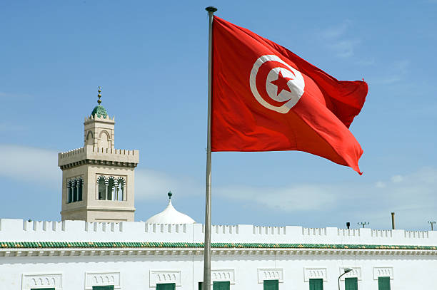 "Tunisia, Tunis, Town Hall square, the Tunisian flag" عيد الجمهورية في تونس: الذكرى 68 لمحطة تاريخية فاصلة