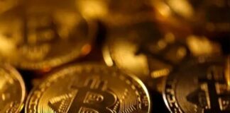 بيتكوين يحطم رقمه القياسي ويصل إلى 124 ألف دولار