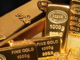 الذهب يتراجع مع توقعات ببقاء الفائدة مرتفعة
