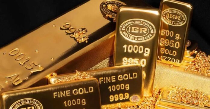 الذهب يتراجع مع توقعات ببقاء الفائدة مرتفعة