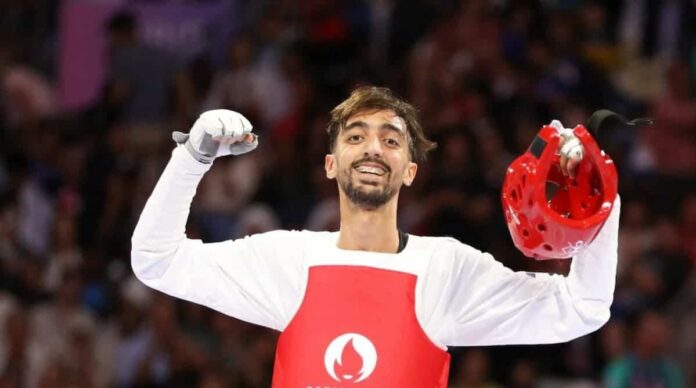 Taekwondo-jendoubi-3 Mohamed Khalil Al-Jandoubi lors des épreuves de taekwondo du Championnat international du Qatar