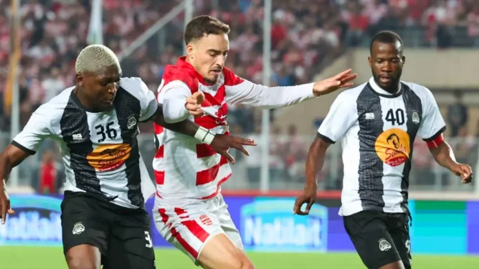 Les joueurs du Club Africain célèbrent leur victoire après le match contre le TP Mazembe